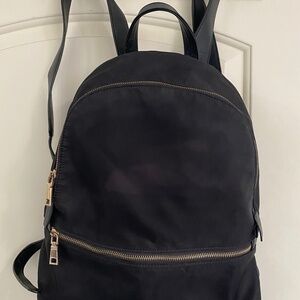 Black mini backpack gold accent